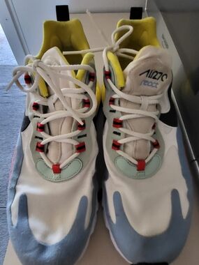 Nike Sneakers with Yellow Tongue and Blue Accents